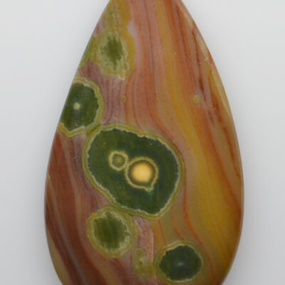 A green and yellow agate tear shaped pendant.