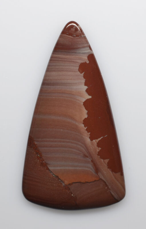 A triangular piece of brown agate on a white background.
