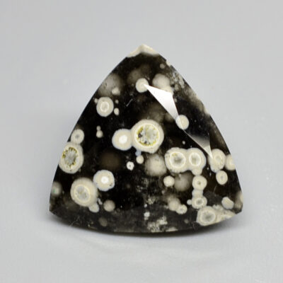 A black and white diamond with white spots.